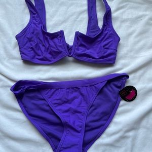 Walmart bright purple swimmy size M never worn full coverage, tie in back